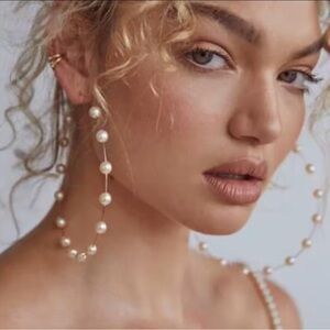 Oversized pearl hoop earrings